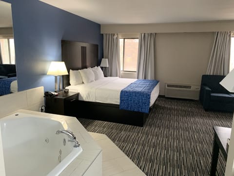 Suite, 1 King Bed, Non Smoking, Jetted Tub | Desk, iron/ironing board, cribs (free), WiFi (free)