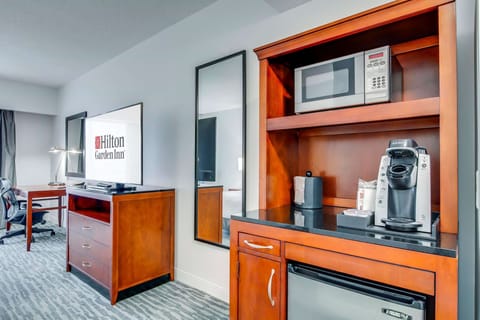 King evolution room | Premium bedding, desk, laptop workspace, iron/ironing board