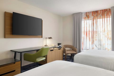 Premium bedding, desk, laptop workspace, iron/ironing board