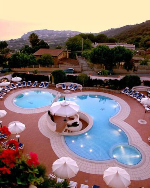 Outdoor pool, open 8:00 AM to 8:30 PM, pool umbrellas, sun loungers
