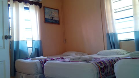 Family Triple Room, Multiple Beds, Private Bathroom, City View | Room amenity