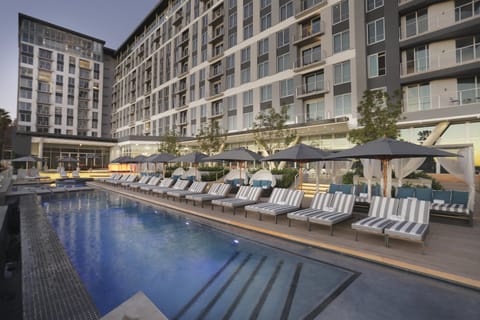 Outdoor pool, pool umbrellas, sun loungers
