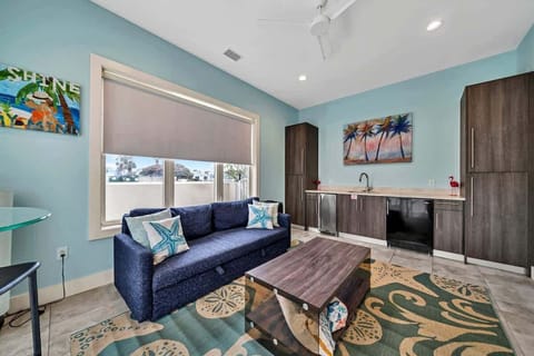 Enjoy This 1st Floor gathering Area With Mini fridge, and Ice Maker, Direclty Off of Your Pool Deck!