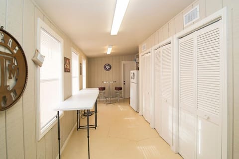 Hallway with washer and dryer