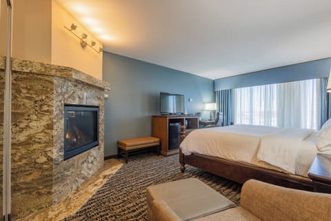 Suite, 1 King Bed, Jetted Tub | 1 bedroom, pillowtop beds, desk, blackout drapes