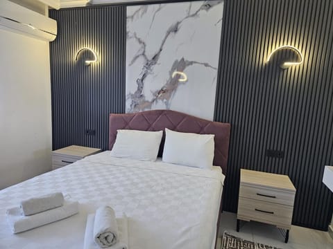 Family Apartment, 1 Bedroom | Desk, soundproofing, iron/ironing board, free WiFi
