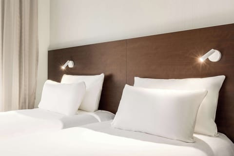 Superior Triple Room | Minibar, in-room safe, desk, soundproofing