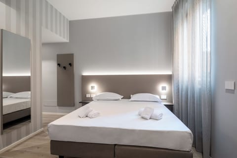 Double or Twin Room | Minibar, in-room safe, desk, free WiFi
