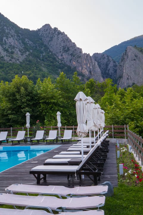 Indoor pool, outdoor pool, pool umbrellas, sun loungers