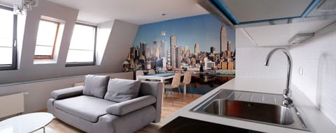 City Studio Suite | Living area | Flat-screen TV