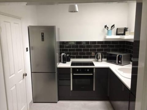 Superior Apartment, 1 King Bed | Private kitchen | Full-size fridge, microwave, oven, stovetop