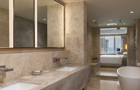 Presidential Suite | Bathroom | Designer toiletries, hair dryer, bathrobes, slippers