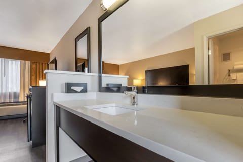 Desk, blackout drapes, iron/ironing board, free cribs/infant beds