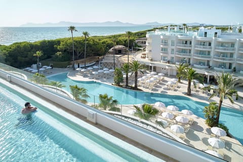 Indoor pool, seasonal outdoor pool, pool umbrellas, sun loungers