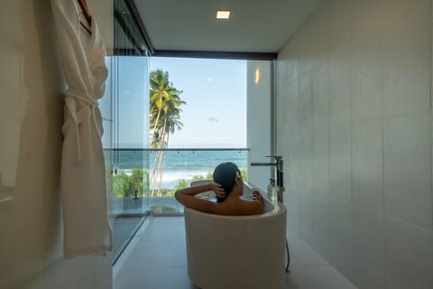 Luxury Suite, 1 King Bed, Balcony, Ocean View | Bathroom | Free toiletries, hair dryer, bathrobes, slippers
