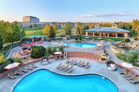 2 outdoor pools, open 8:00 AM to 11:00 PM, pool umbrellas, sun loungers