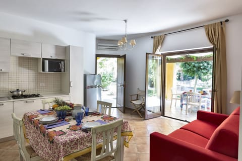 Apartment, 1 Bedroom | Living area | Flat-screen TV