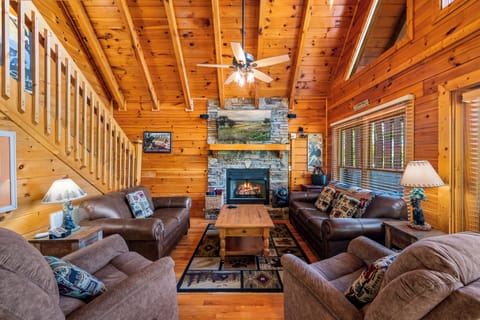 Living Room with gas fireplace. 2 comfy rockers in foreground