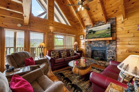 Living room with gas fireplace, canoe sofa table