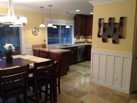 Kitchen and Dining Room overlooking outside Private Patio