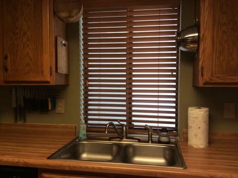 Kitchen sink with view toward front entrance