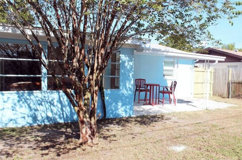 Back of house with patio