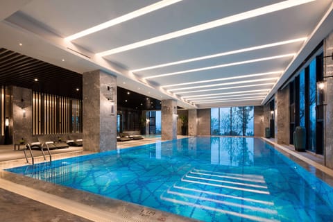 Indoor pool, open 7:00 AM to 10:00 PM, sun loungers