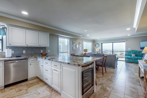Brand new kitchen w/granite countertops and gorgeous view of gulf.  Bon appetit!