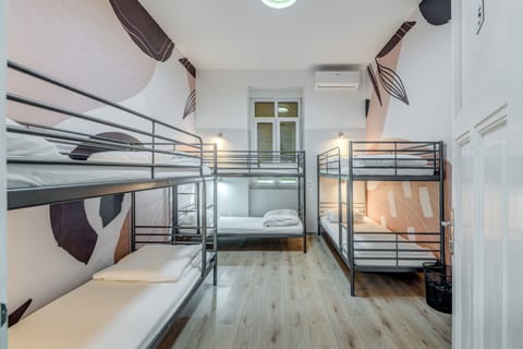 Shared Dormitory (2 beds in 6 bed dorm) | 5 bedrooms, down comforters, in-room safe, free WiFi