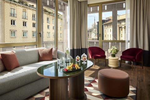Premium bedding, down comforters, minibar, in-room safe