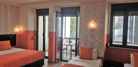 Family Suite, Private Bathroom | Desk, blackout drapes, soundproofing, iron/ironing board
