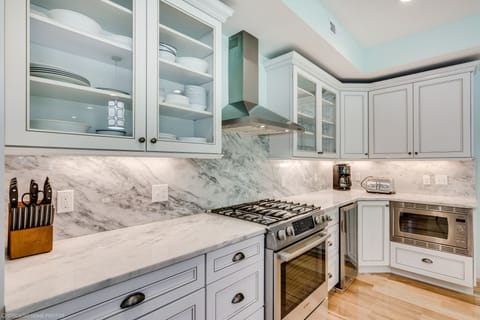 Kitchen is well stocked and appliances are top of the line professional grade