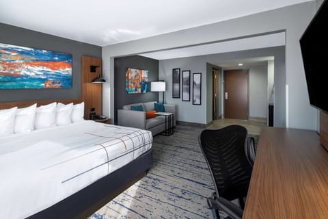 Down comforters, desk, laptop workspace, blackout drapes