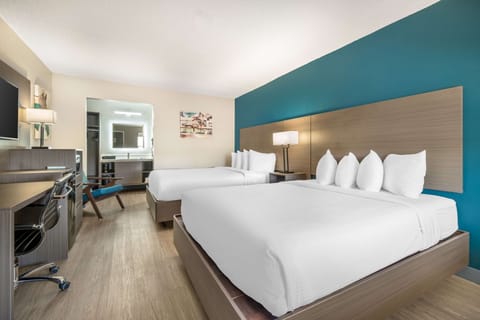 Standard Room, 2 Queen Beds, Non Smoking, Refrigerator & Microwave (Deluxe) | Blackout drapes, iron/ironing board, free WiFi, bed sheets