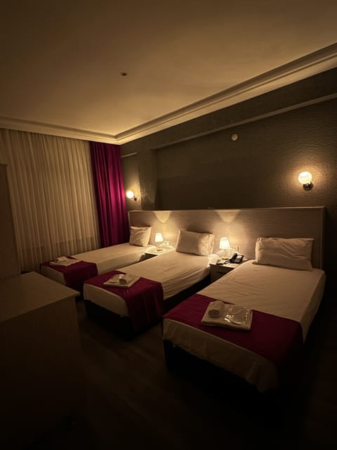 Standard Triple Room | Premium bedding, in-room safe, desk, free cribs/infant beds
