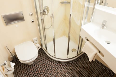 Shower, free toiletries, hair dryer, towels