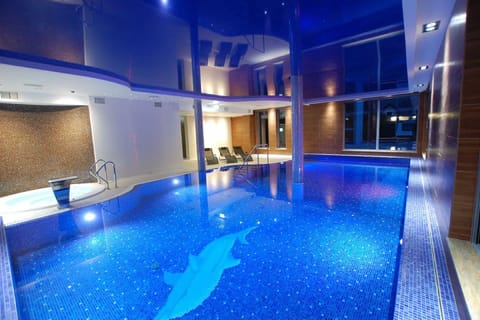 Indoor pool, open 8:00 AM to 9:00 PM, sun loungers