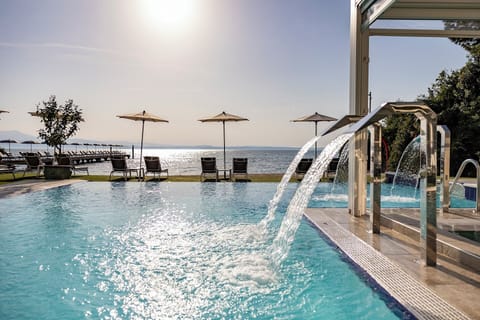 Indoor pool, outdoor pool, pool umbrellas, sun loungers