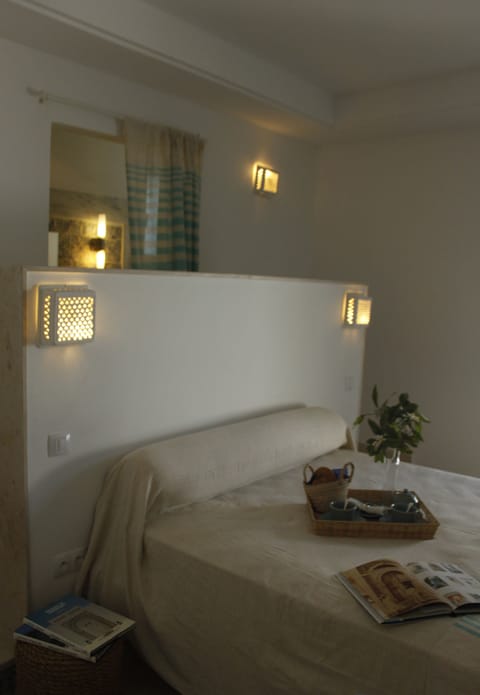 Comfort Room | Minibar, individually decorated, blackout drapes, iron/ironing board
