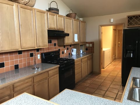 Clean, stocked kitchen area