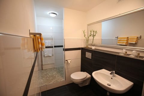 Suite, 1 Bedroom | Bathroom | Shower, free toiletries, hair dryer, towels
