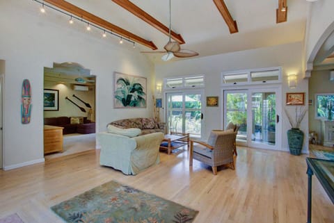 High beam ceilings - natural light. Opens to media room and lanai/backyard.