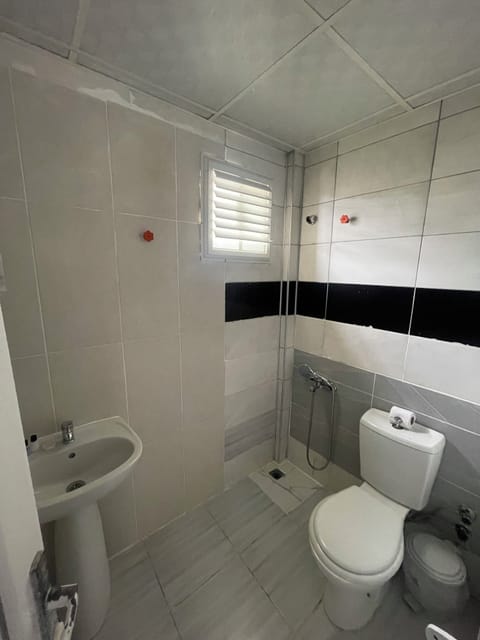 Basic Double or Twin Room | Bathroom | Shower, free toiletries, hair dryer, slippers