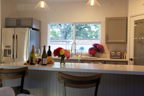 36" fridge, ice maker, filtered water, counter top seats 4. 