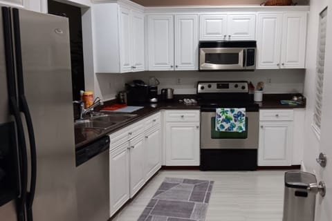 updated kitchen stocked with everything necessary for a gourmet meal.