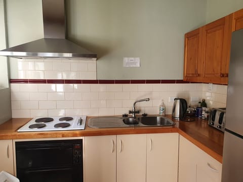 Family Apartment, 2 Bedrooms, Garden View | Private kitchen | Coffee/tea maker, electric kettle