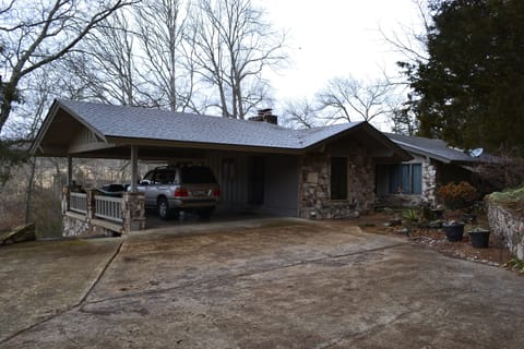 Covered parking and space to the left for three more vehicles.
