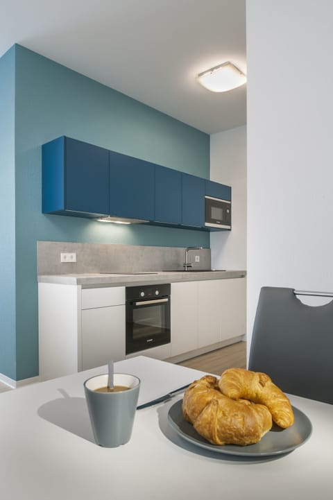 Apartment, Ground Floor | Private kitchen | Fridge, microwave, stovetop, dishwasher