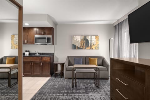 27-inch TV with cable channels, MP3 dock