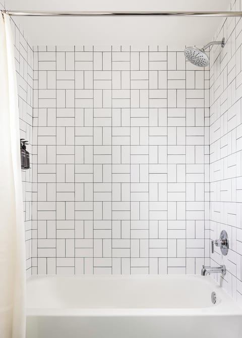 Designer toiletries, hair dryer, towels, soap